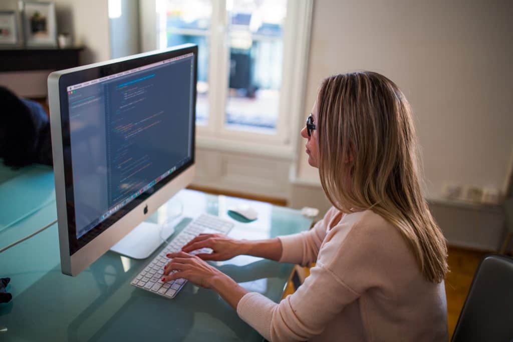 marketing-woman-apple-desk-1024x683